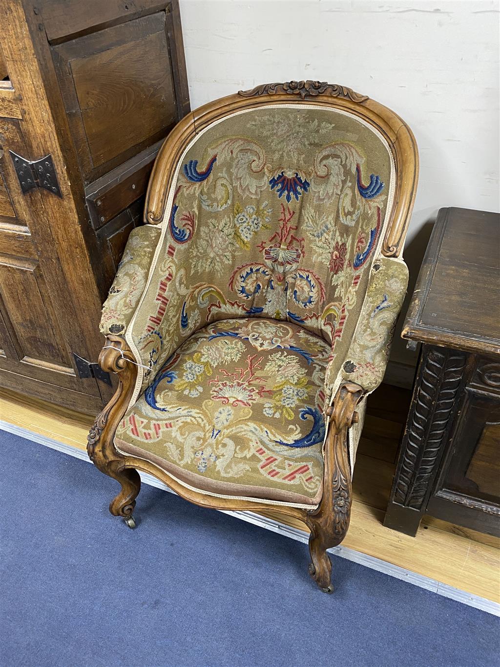 A Victorian walnut armchair